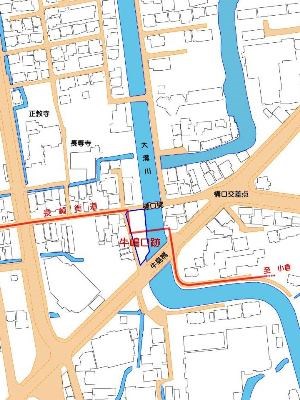 中央を縦に流れる大溝川の東側に「牛嶋口跡」を青い枠で示し、付近の寺院名や現在の交差点名、主要道路を簡略化した線と文字で表現した現代の周辺案内図。